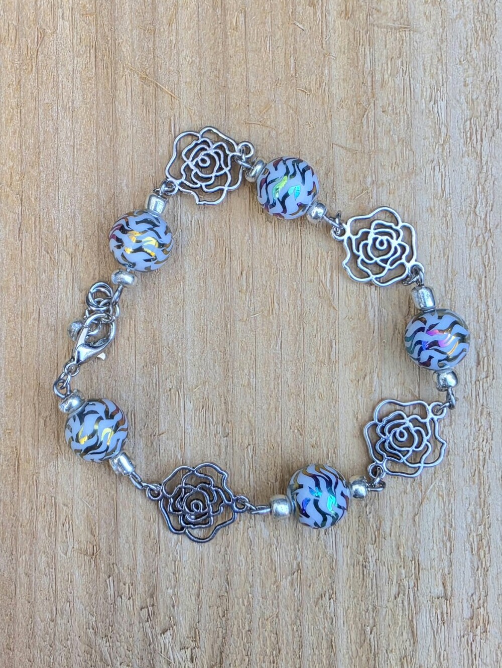 Stainless Steel Rose Charm Bracelet with Iridescent Glass Beads